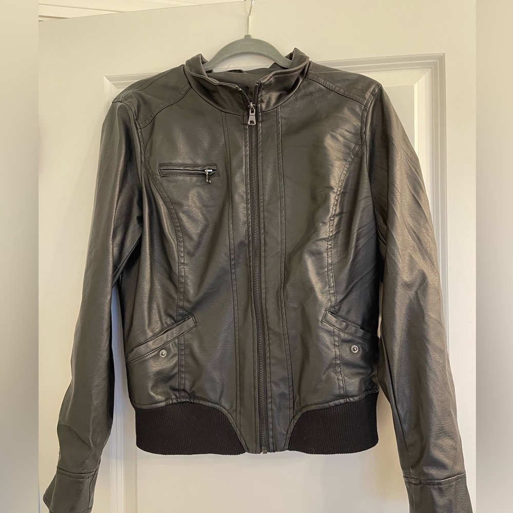 Black polyester leather look alike jacket. Worn once.